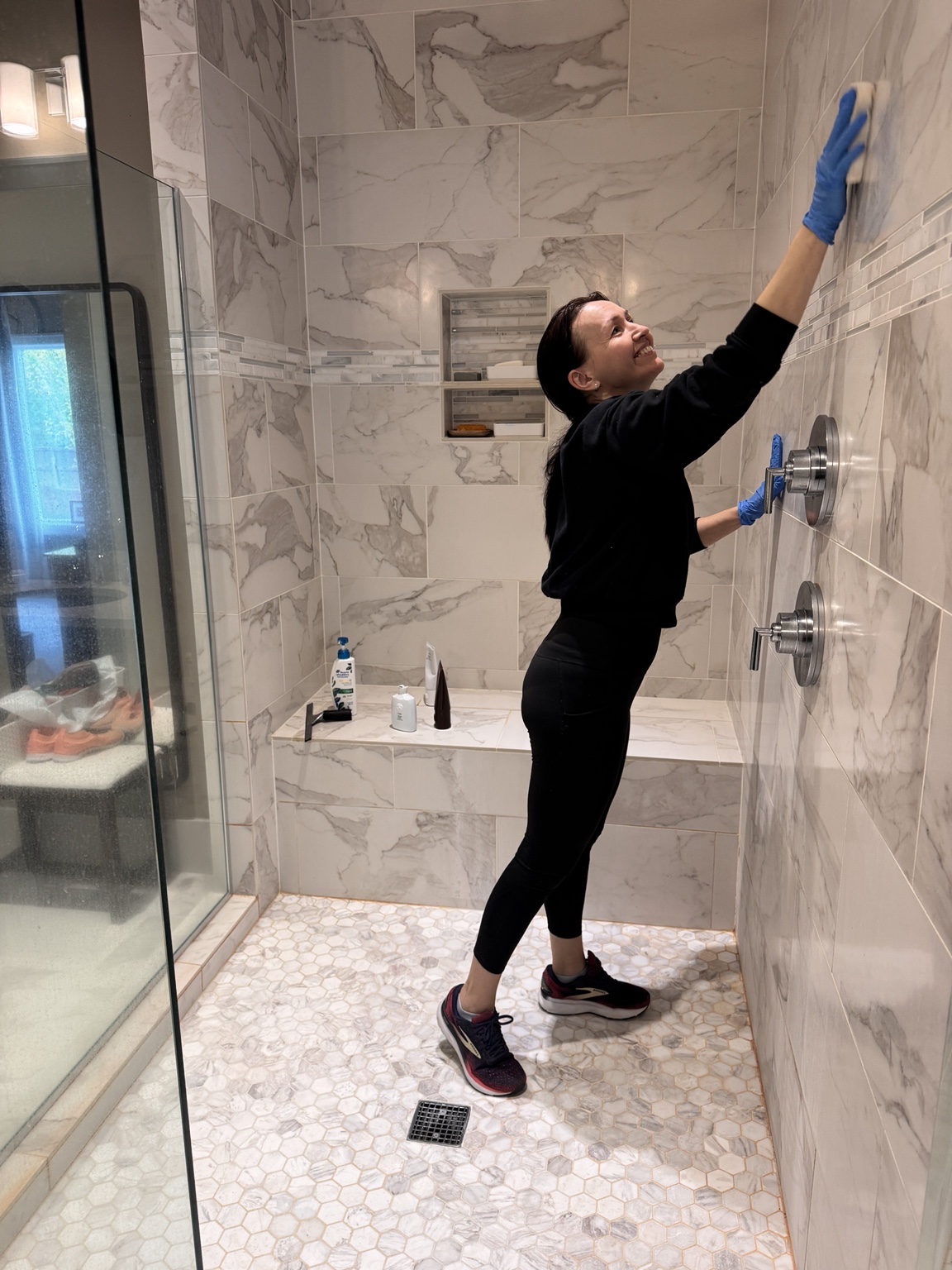 Cleaning shower tile by hand