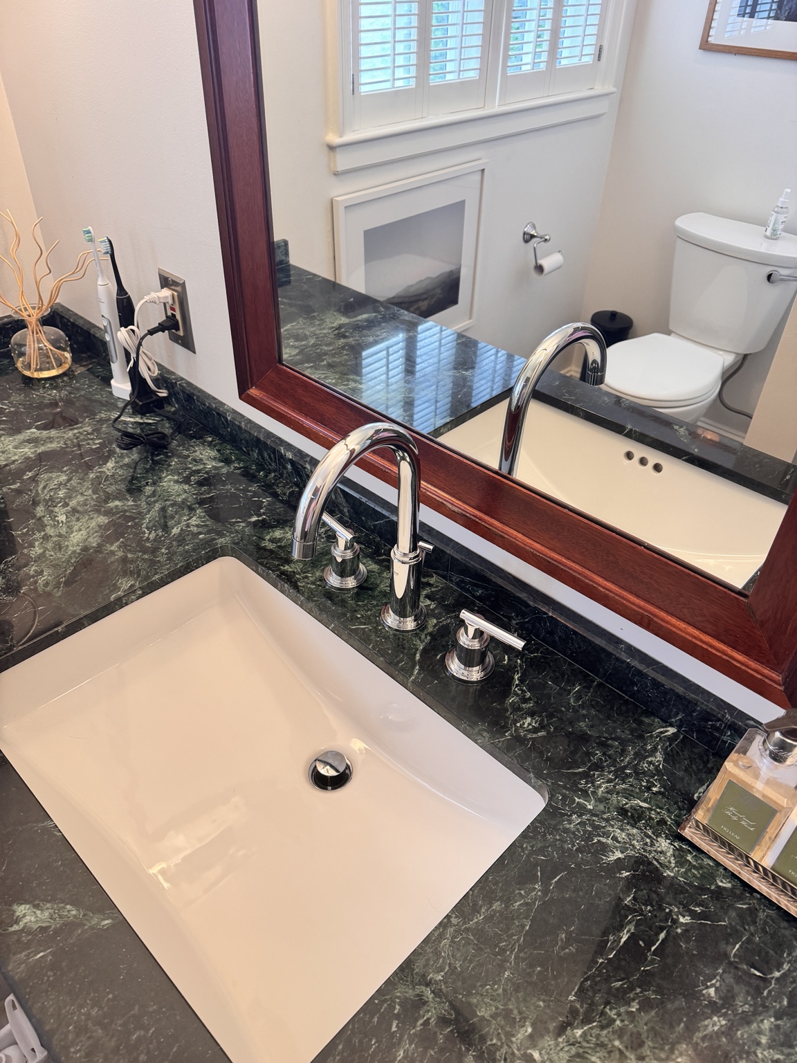Clean sink with green stone countertop